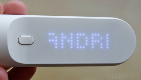 That simple LED display is hiding basic touchscreen functionality, letting you select which family member is the current user.